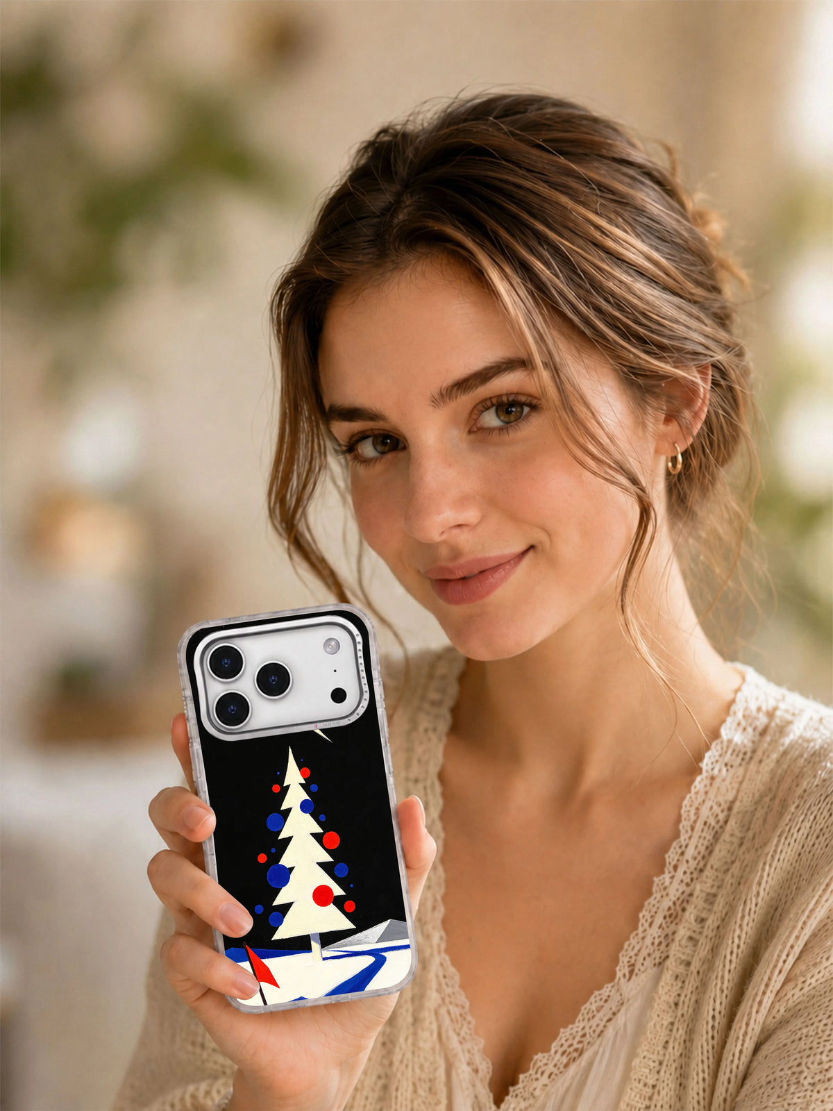 Lifestyle view of the Comet Over Black Velvet iPhone 17 Pro case held in one hand