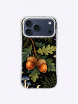 Oak Leaf Seed Cosmos pattern with paired copper acorns, green oak leaves, blue mushrooms, and small stars