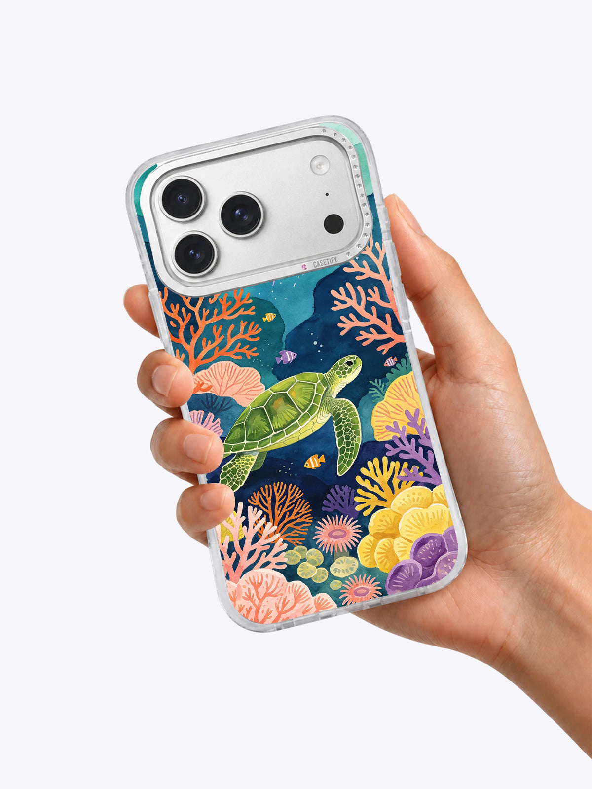 Coral Lantern Garden iPhone case held in hand