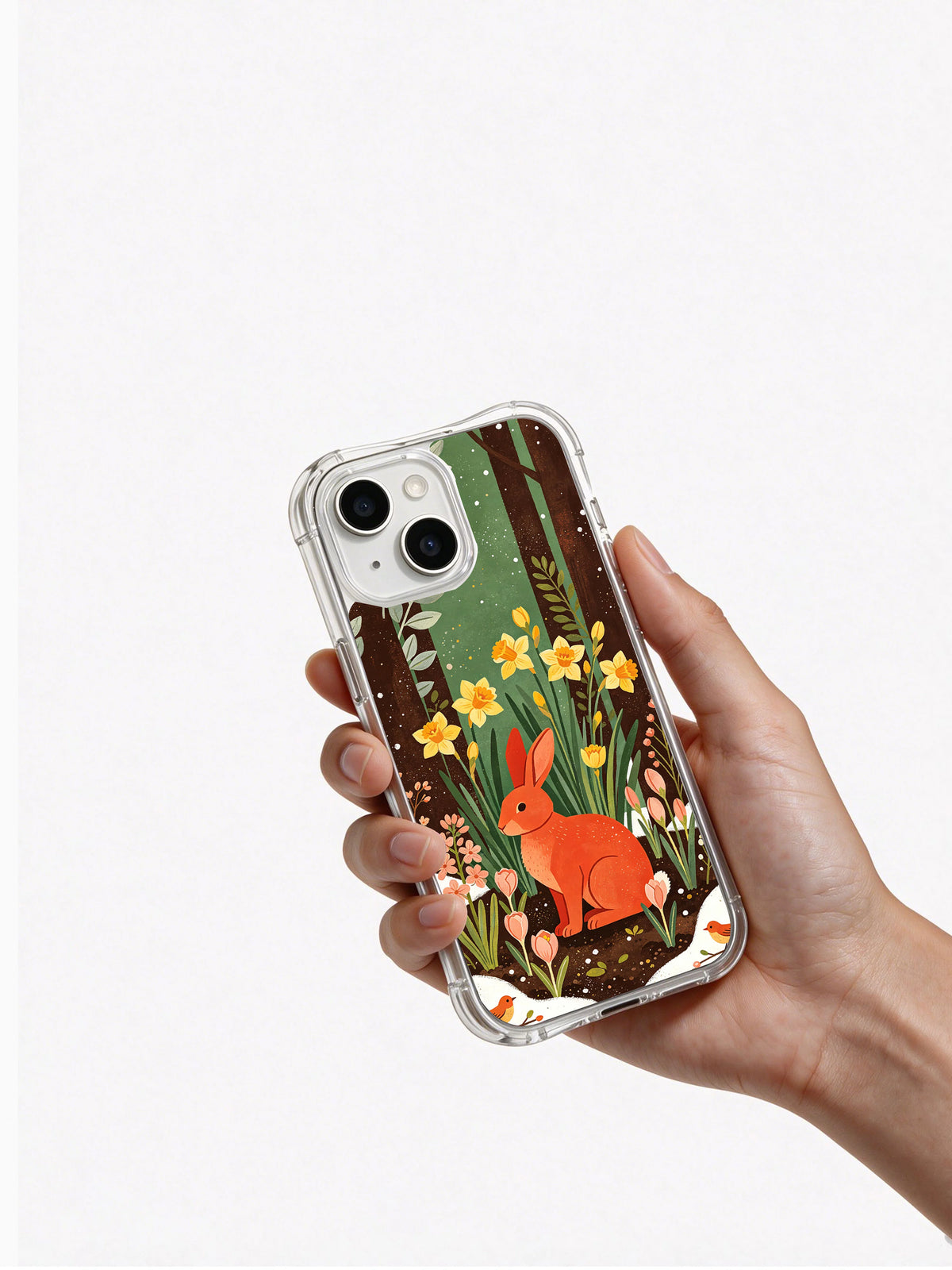 Coral Rabbit Garden iPhone 13 case shown in hand against a neutral background