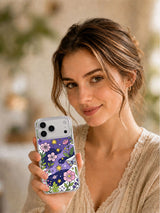 Cosmic Flower Parade iPhone 17 Pro Max case held in hand