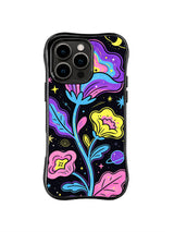 Neon Cosmic Garden: Neon pink, blue and yellow flowers curl among moons, planets and stars on black.