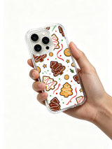 Cozy Noel Scatter iPhone 13 Pro case held in hand