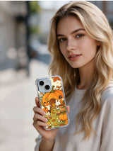 Woman holding Cozy Pumpkin Cottage Animals iPhone 14 case
