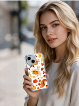 Cranberry Fox Celebration: Person holding the illustrated case in an outdoor portrait.