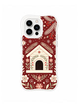 Cream cabin with dark arched doorway framed by pine branches flowers and snowflakes on cranberry iPhone 13 Pro case