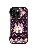 Crescent Village Pines pattern on a black iPhone 13 Pro case with a tall folk cottage, moon panels, stars and small houses on dark plum