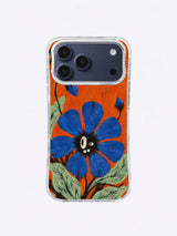 A Bloom with Crooked Teeth Asymmetric Joy Flower artwork on iPhone 17 Pro Max case
