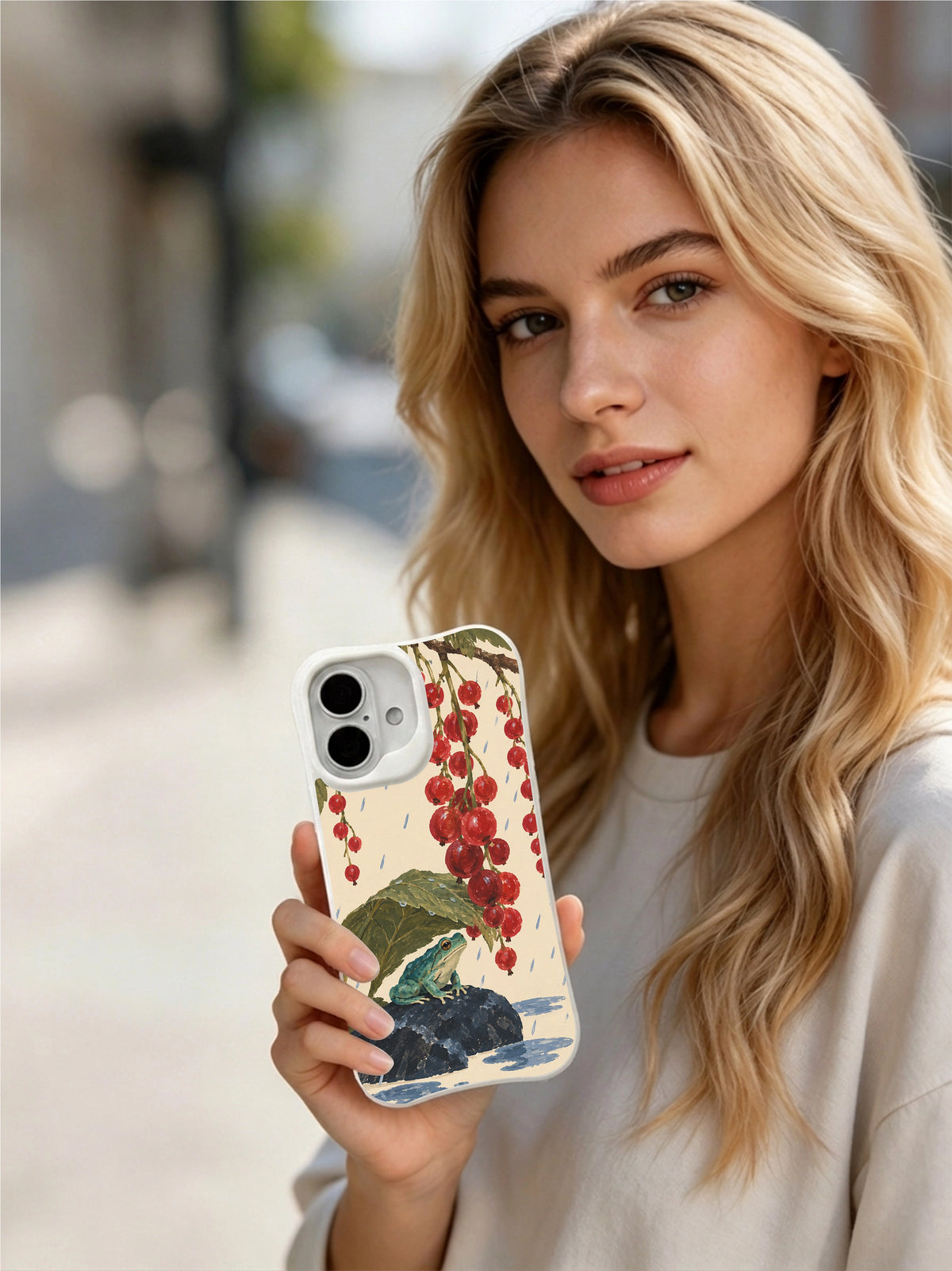 Lifestyle view of Currants in the Rain white iPhone 16 case