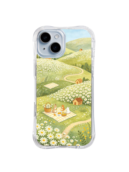 Daisy Basket Hill: A picnic blanket and basket sit among daisies.
