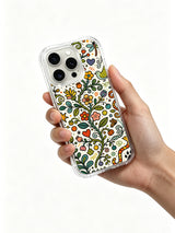 Dancing Wild Hearts floral iPhone 14 Pro case held in hand