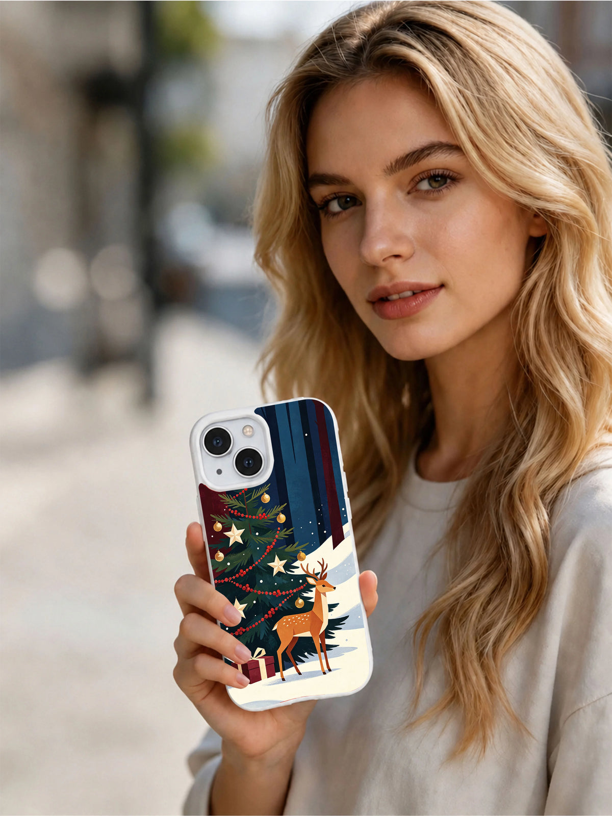 Person holding the deer at the cranberry Christmas tree iPhone 14 case