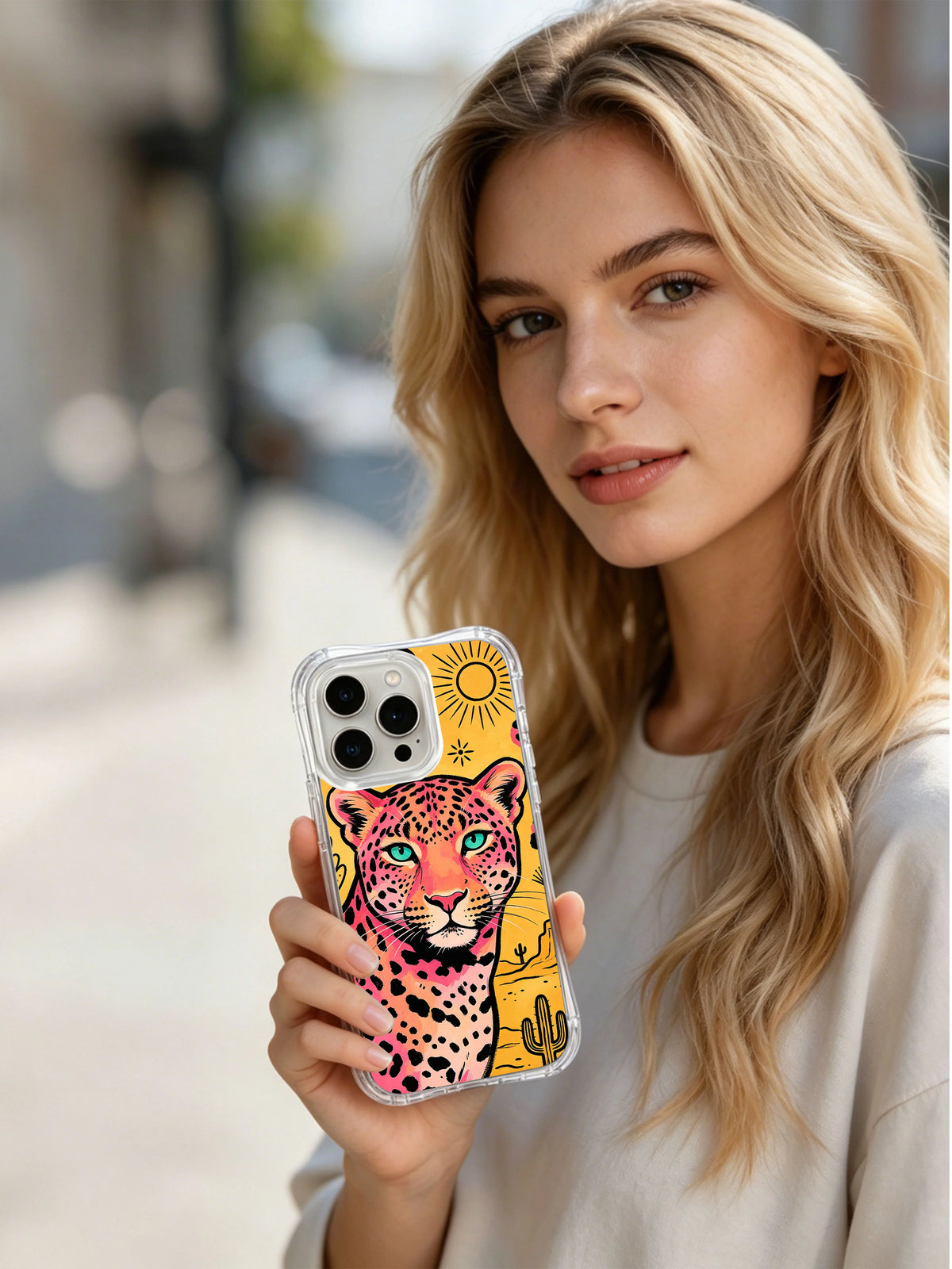 Lifestyle view of Desert Cowgirl Cheetah iPhone 13 Pro Max case showing the close desert portrait