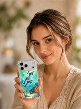 Dolphins After Rain ocean art iPhone case in a lifestyle setting