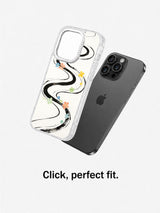 Clear abstract floral case separated from an iPhone 16 Pro Max