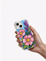 Hand holding Dream Neon Garden iPhone 14 case