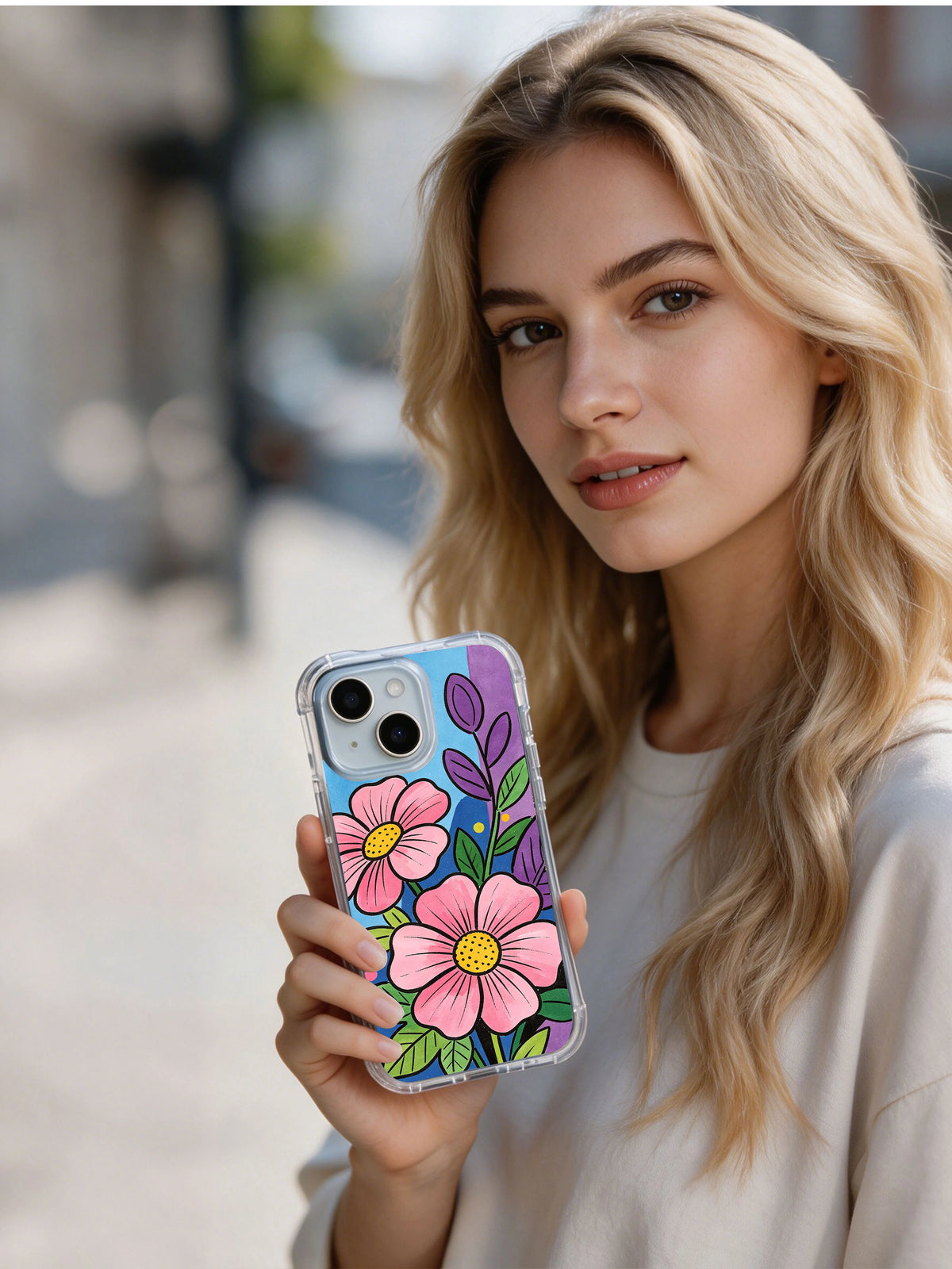 Model holding Dream Neon Garden iPhone 14 case