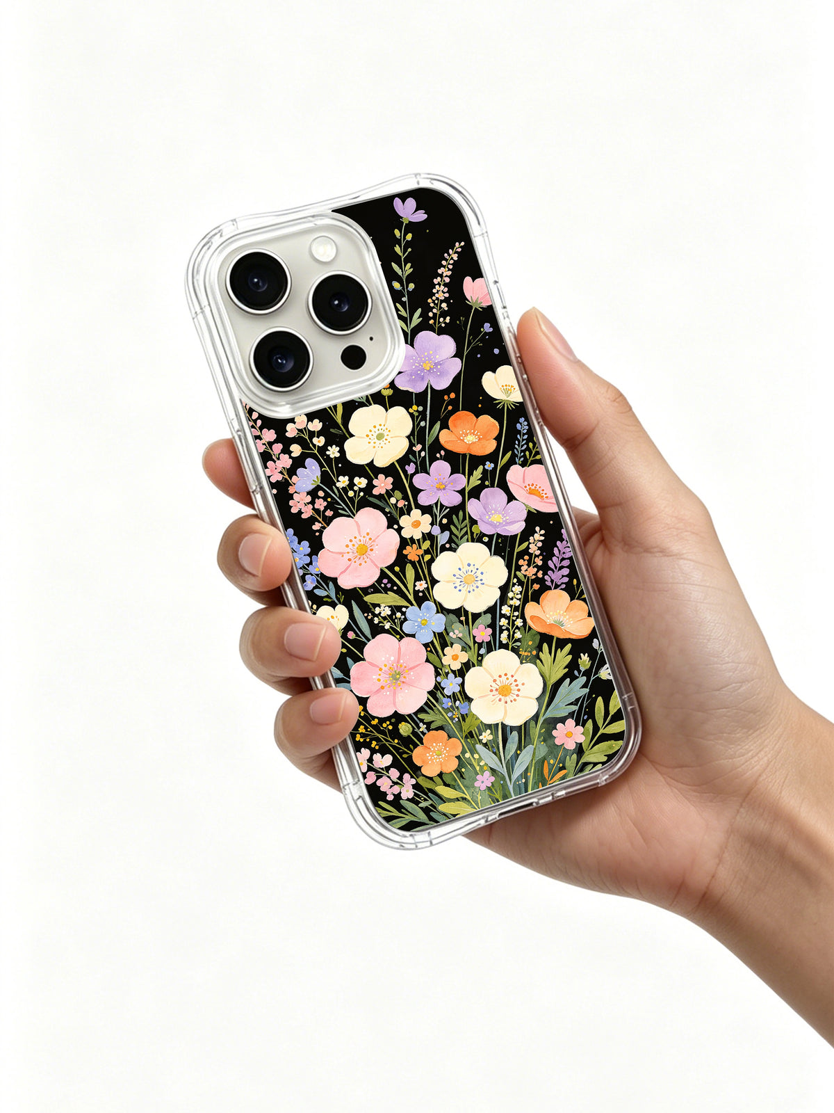 Dream Wildflower Garden iPhone 15 Pro case held in hand