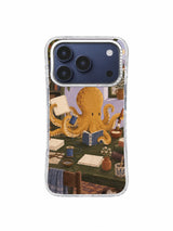 Octopus surrounded by bookbinding tools on a dark olive table on an iPhone 17 Pro case