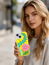 Electric Bloom Geometry iPhone 15 case in hand