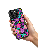 Electric Garden Stone Tales iPhone 15 Pro case hand-held view