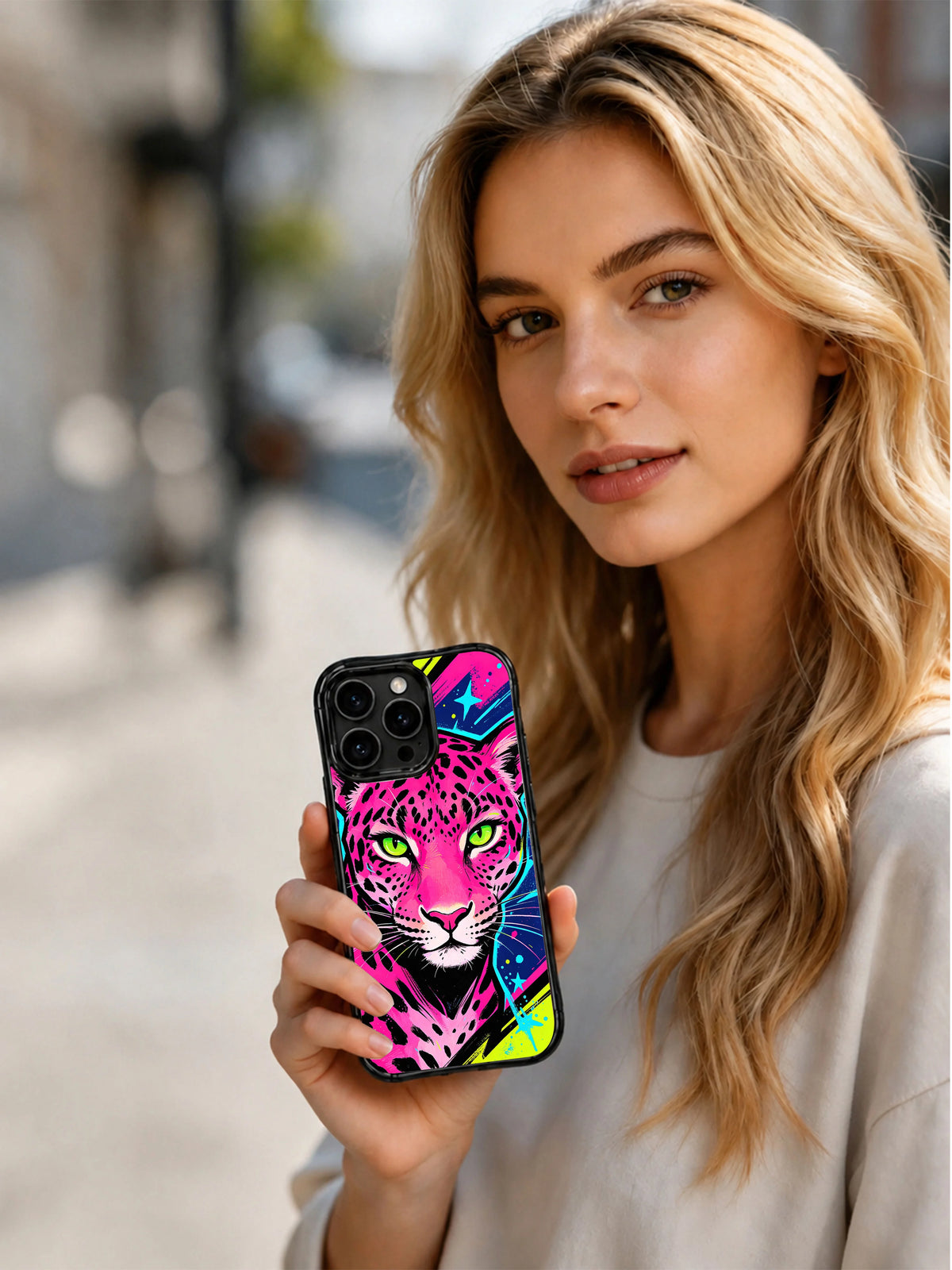 Lifestyle photograph of Electric Leopard Queen black iPhone 13 Pro Max case in the multicolor graphic pattern
