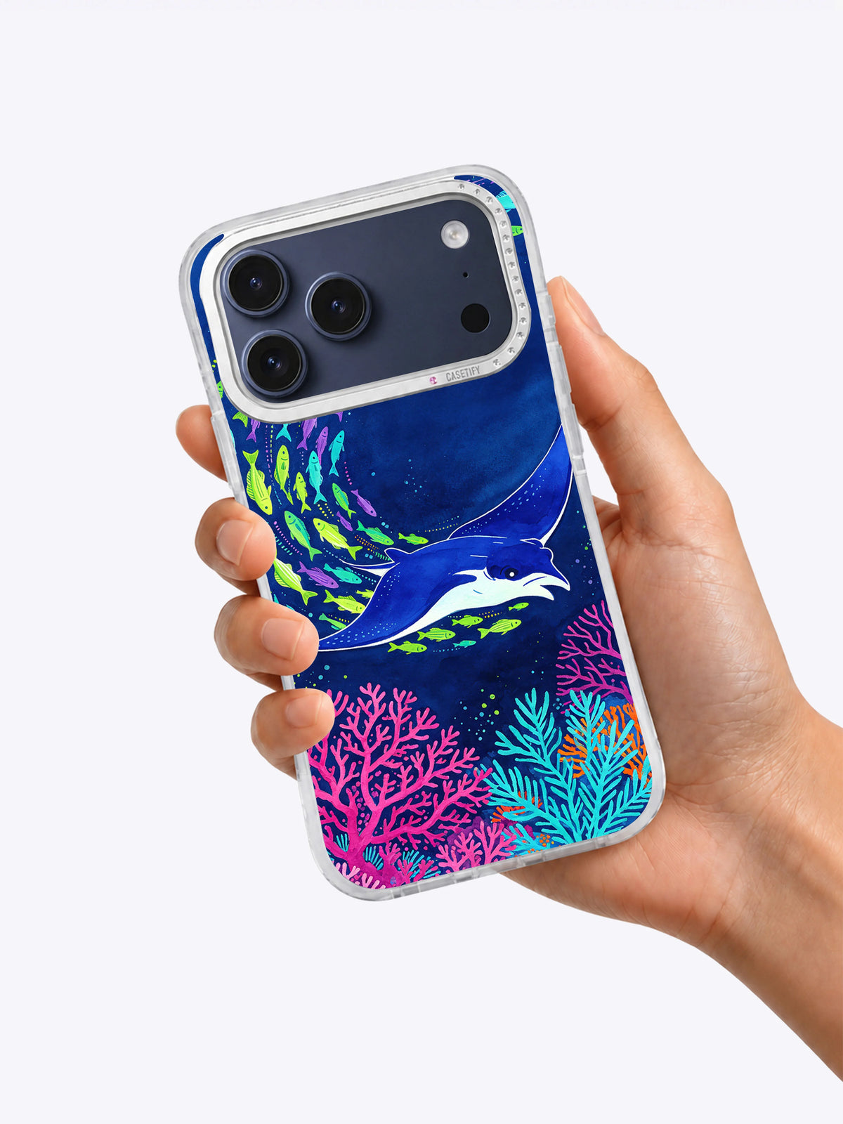 Hand holding Electric Reef Dance manta ray iPhone case