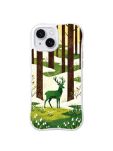 Emerald stag beneath chocolate-brown trunks and butter-yellow sky on an iPhone 13 case