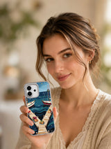 Evergreen Harbor iPhone 17 case in a warm lifestyle setting