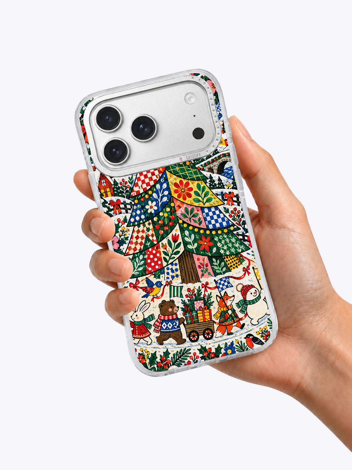 Evergreen Patchwork Parade iPhone case shown in hand