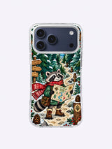 Front product view of Evergreen Raccoon Ranger artwork on a clear iPhone 17 Pro Max case