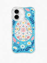 Festival of Tiny Petals / Tiny Petal Medallion: One large ivory egg packed with tiny pink, navy and yellow flowers around a central pink blossom.
