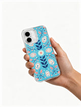 Festival of Tiny Petals: A hand holding the illustrated case.