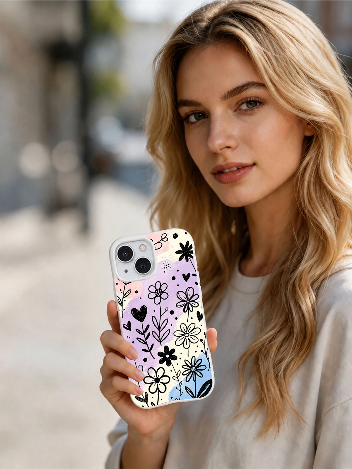 Product or handheld view of the Flower Power Sketchbook case