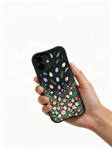Forever Spring Easter: Hand holding the case with its illustrated back facing outward.