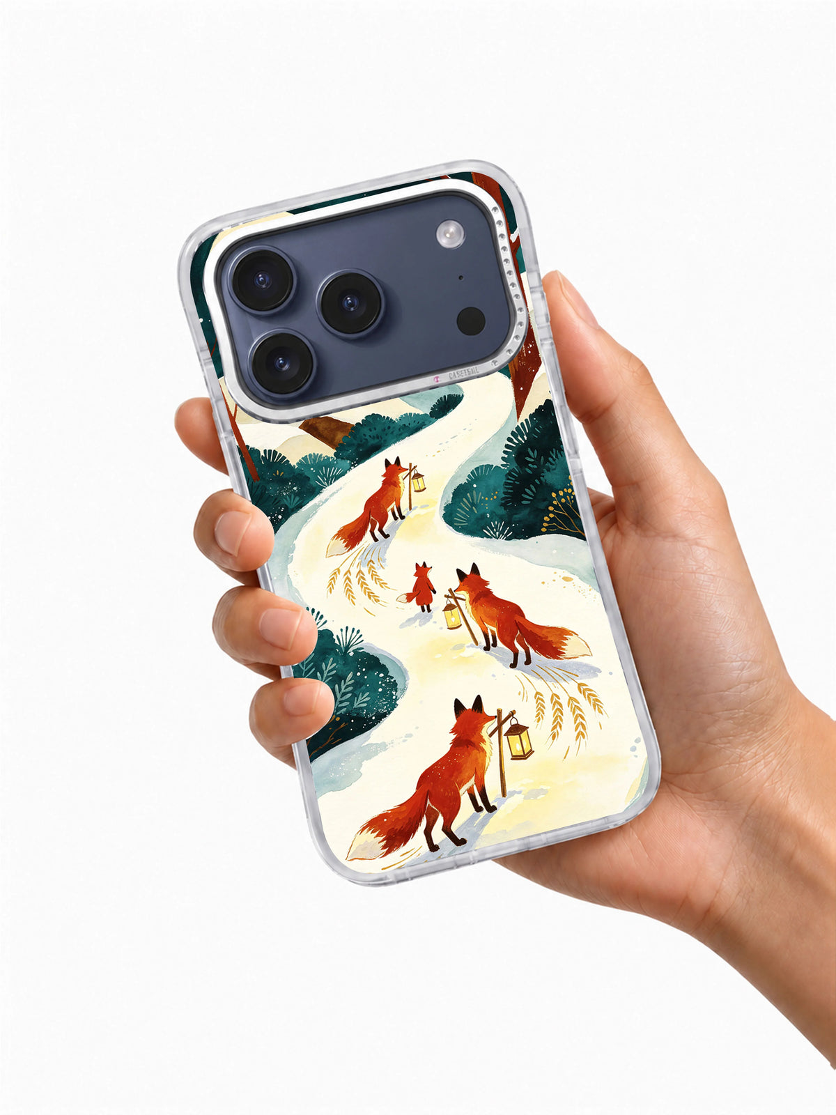 Hand holding an iPhone case printed with Foxlight Homeward fox artwork