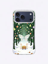 Frostwing Orchard iPhone 17 Pro Max case with pale butterfly, rabbits, fruit cart and dark green winter trees