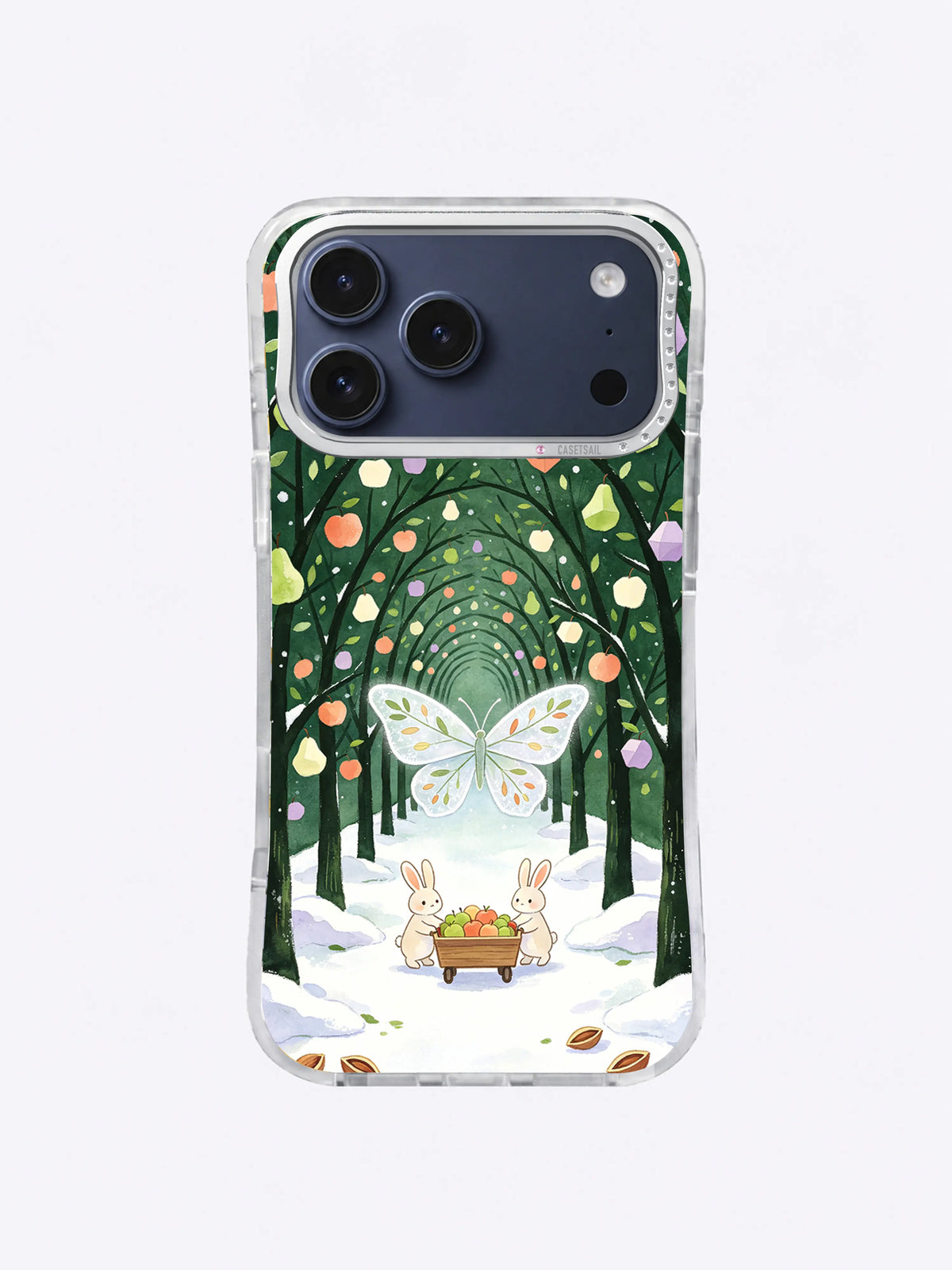 Frostwing Orchard iPhone 17 Pro Max case with pale butterfly, rabbits, fruit cart and dark green winter trees