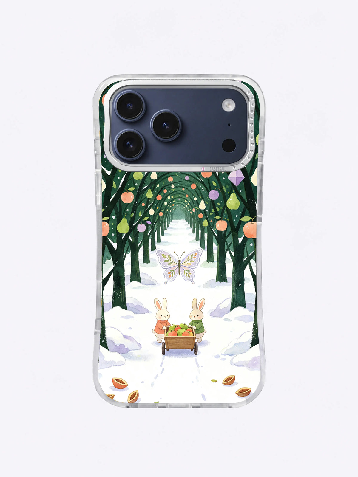 Frostwing Orchard iPhone 17 Pro Max case showing two rabbits pushing a fruit cart along a snowy orchard path