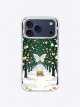 Frostwing Orchard iPhone 17 Pro Max case with cream butterfly, coral fruit and midnight-green orchard canopy