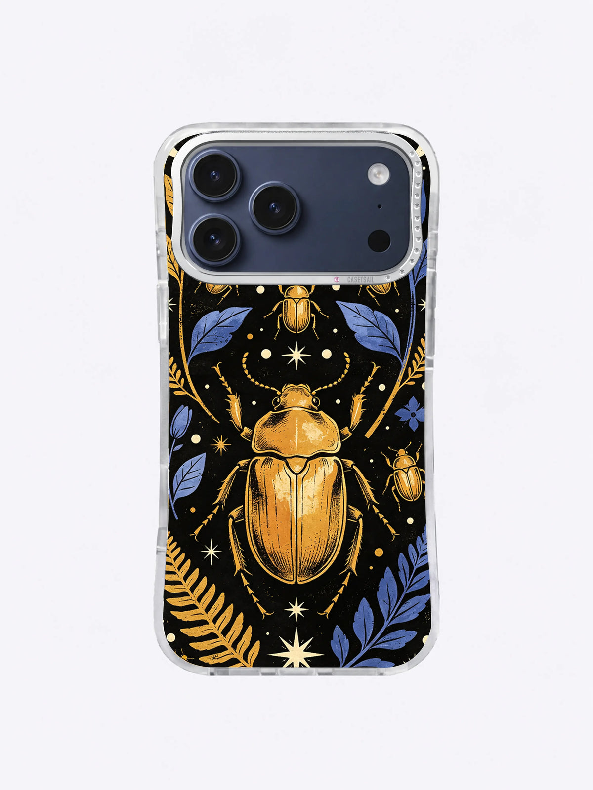 Symmetrical gold beetle on black with indigo leaves, ivory stars, and curved botanical stems