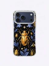 Golden beetle night garden with blue flowers, smaller insects, stars, and a deep black field