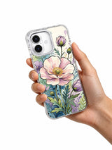 Golden Meadow Fantasy iPhone 17 case held in hand