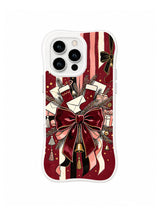Grand Velvet Bow pattern on a white iPhone 14 Pro case with an oversized burgundy bow, pink ribbon tails, stockings, envelopes and gold dots
