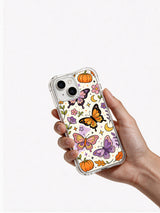 Halloween Butterfly Dream Meadow iPhone 14 case in hand