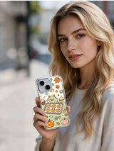 Woman holding Halloween Cookie Monster Bakery iPhone 14 case