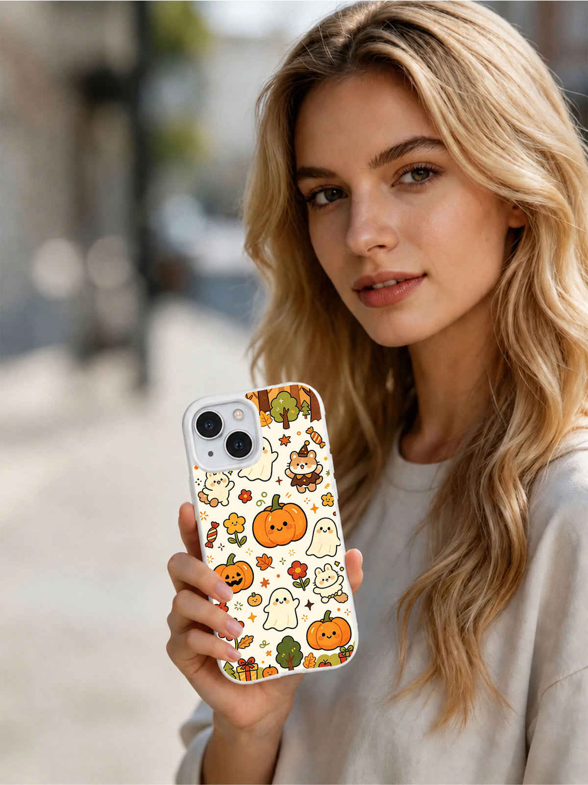 Woman holding Happy Halloween Friendship Festival iPhone 14 case