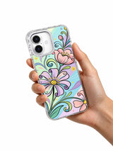 Colorful flower art iPhone 17 case held in hand