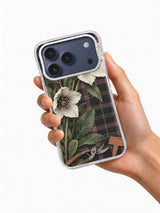 Hellebores After the Door Closes iPhone 17 Pro case shown in hand