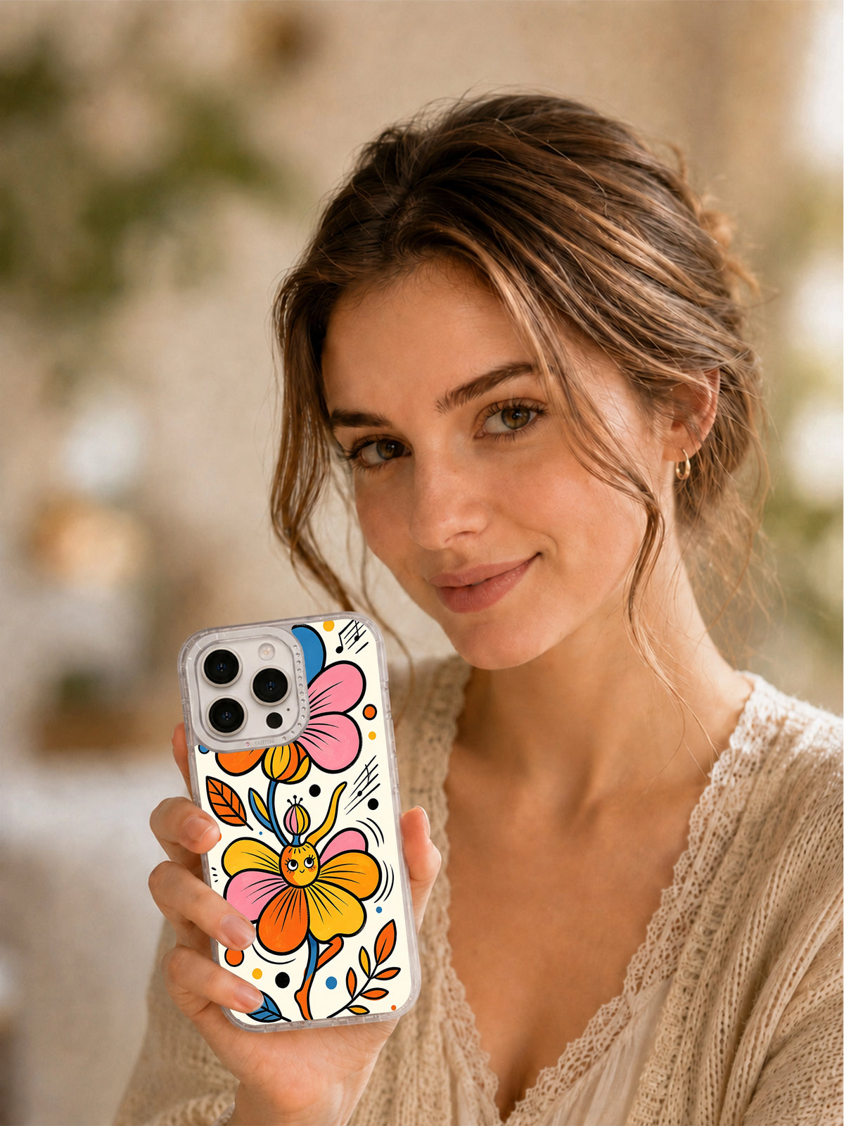 Whimsical flower creature iPhone case lifestyle portrait